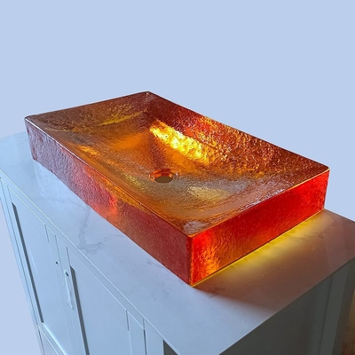 Amberfarbene Glasverglasung Waschbecken, Wasserhahn, freies Glas, Spülbecken