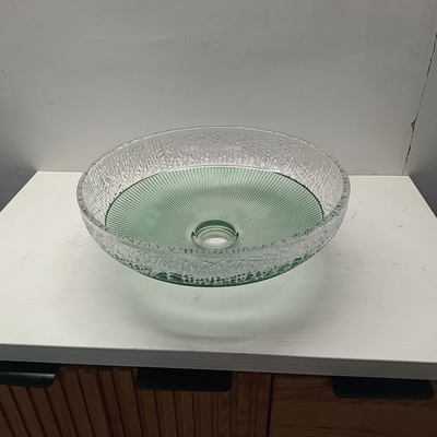 Glasbehälter mit glatter Oberfläche mit zentraler Abflusslage