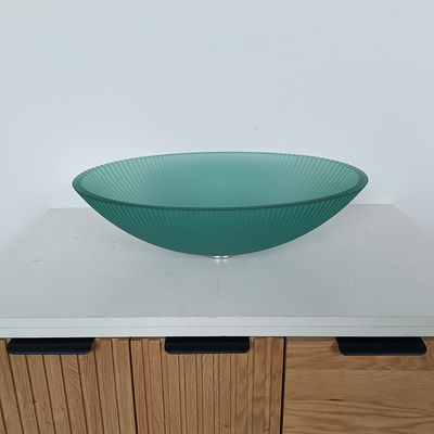 Glaswaschbecken mit zentralem Abfluss